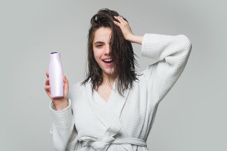 health hair beauty concept beautiful young girl studio with wet hair with balm bottle beauty haircare cosmetics woman hold bottle shampoo conditioner 265223 18807